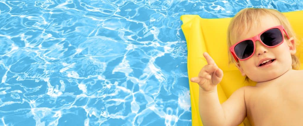 Child on a swimming pool float